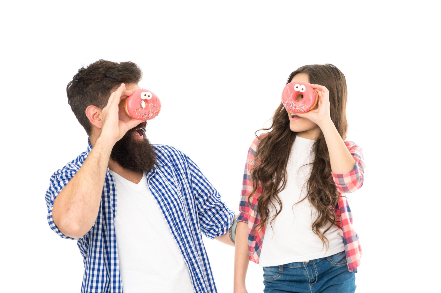 Image of child and adult with donuts.
