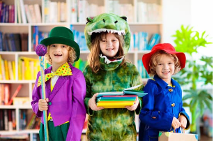 Kids in costumes at a library