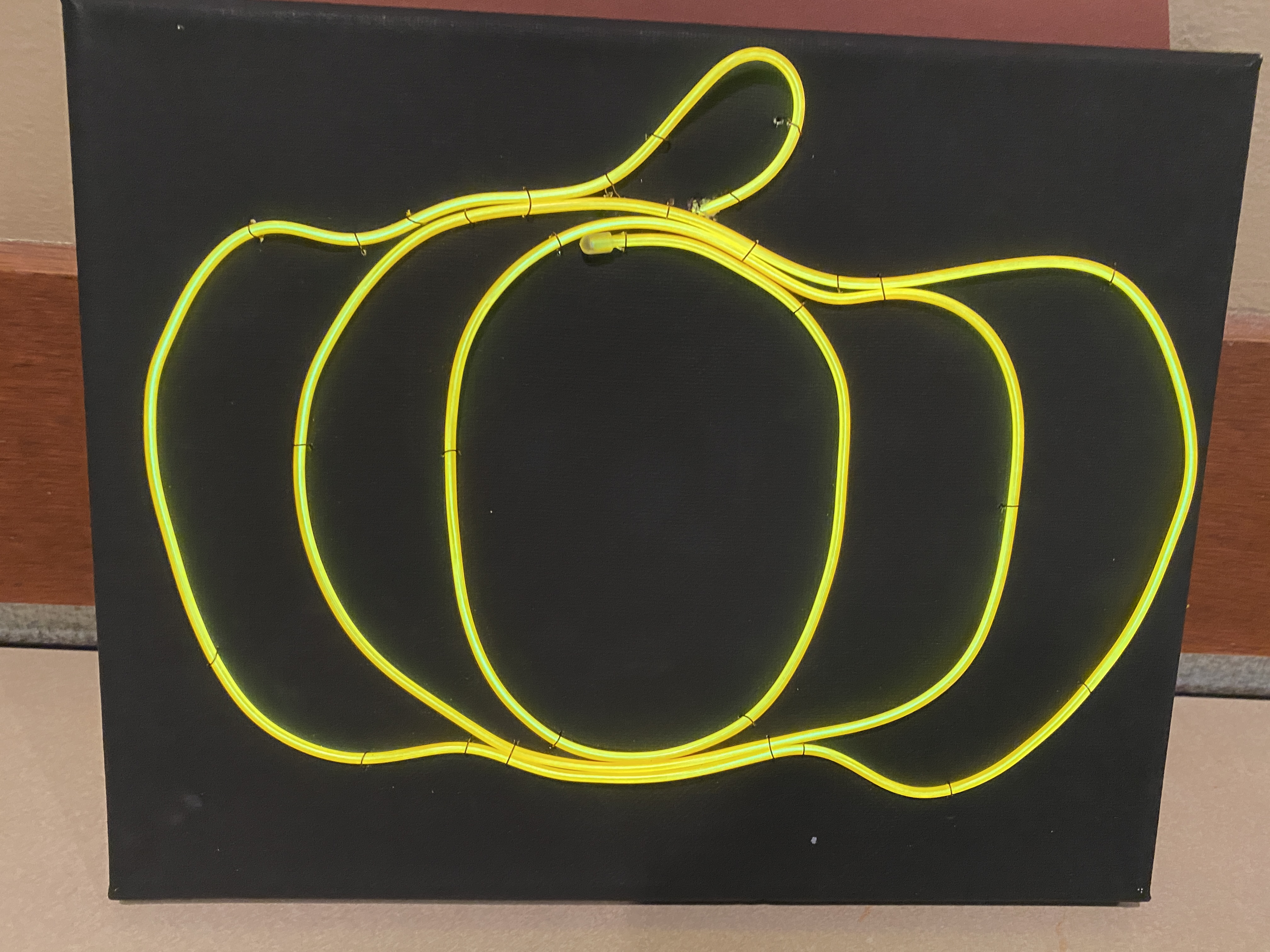 Image of pumpkin neon sign.